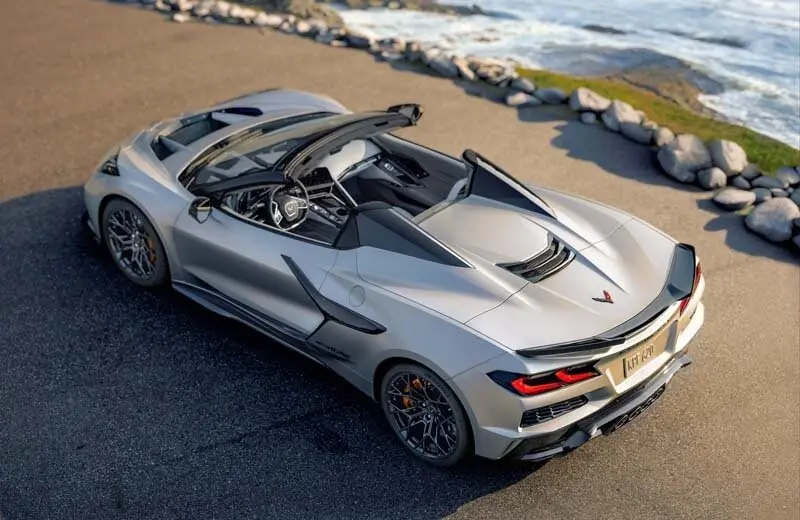 Rear 3/4 view of 2026 Chevrolet Corvette ZR1X Quail Silver Limited Edition. Preproduction model shown, actual production model may vary.