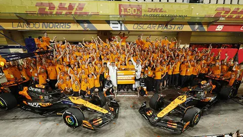 The McLaren team celebrate securing the Constructors Championship title