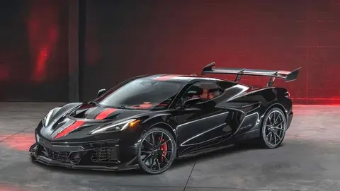 Front 3/4 view of Corvette ZR1X Convertible with ZTK Performance Package in Black. Preproduction model shown, actual production model may vary.