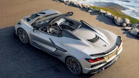 Rear 3/4 view of 2026 Chevrolet Corvette ZR1X Quail Silver Limited Edition. Preproduction model shown, actual production model may vary.