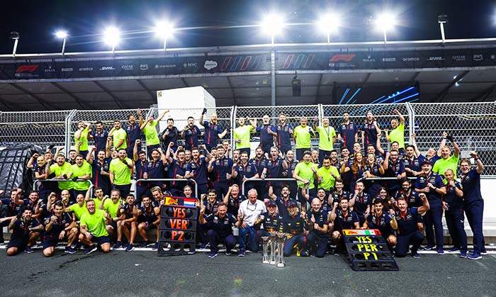 JEDDAH, SAUDI ARABIA - MARCH 19: Race winner Sergio Perez of Mexico and Oracle Red Bull Racing, Second placed Max Verstappen of the Netherlands and Oracle Red Bull Racing and the Red Bull Racing team celebrate after the F1 Grand Prix of Saudi Arabia at Jeddah Corniche Circuit on March 19, 2023 in Jeddah, Saudi Arabia. (Photo by Mark Thompson/Getty Images)