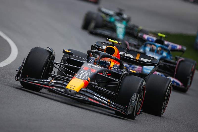 CIRCUIT GILLES-VILLENEUVE, CANADA - JUNE 18: Sergio Perez, Red Bull Racing RB19 during the Canadian GP at Circuit Gilles-Villeneuve on Sunday June 18, 2023 in Montreal, Canada. (Photo by Jake Grant / LAT Images)