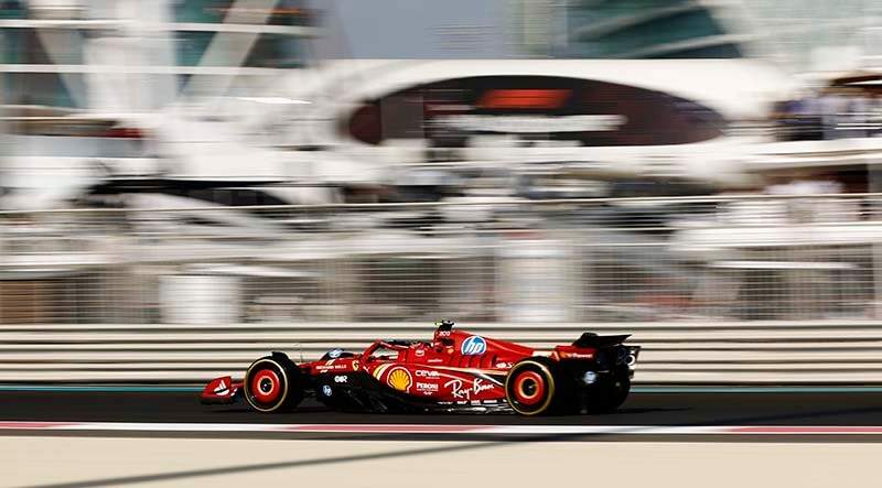 YAS MARINA CIRCUIT, UNITED ARAB EMIRATES - DECEMBER 07: Carlos Sainz, Ferrari SF-24 during the Abu Dhabi GP at Yas Marina Circuit on Saturday December 07, 2024 in Abu Dhabi, United Arab Emirates. (Photo by Zak Mauger / LAT Images)