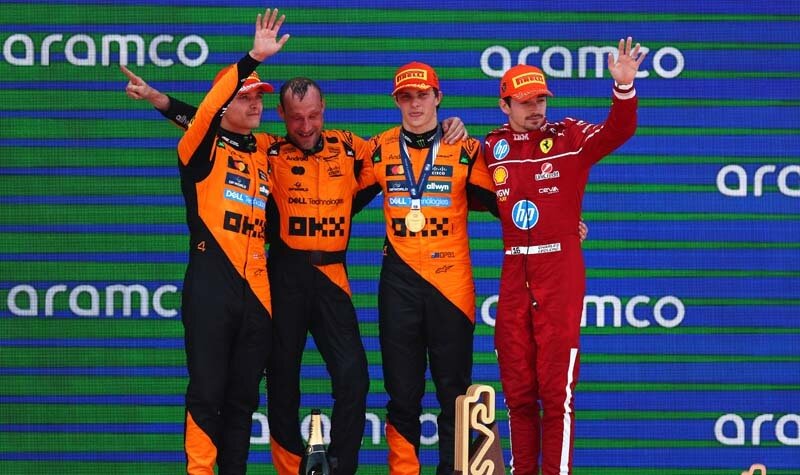 BARCELONA, SPAIN - JUNE 01: Race winner Oscar Piastri of Australia and McLaren, Second placed Lando Norris of Great Britain and McLaren and Third placed Charles Leclerc of Monaco and Scuderia Ferrari on the podium during the F1 Grand Prix of Spain at Circuit de Barcelona-Catalunya on June 01, 2025 in Barcelona, Spain. (Photo by Andy Hone/LAT Images)