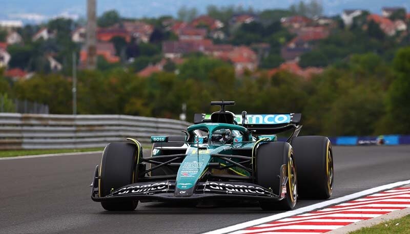 BUDAPEST, HUNGARY - AUGUST 03: Lance Stroll of Canada driving the (18) Aston Martin F1 Team AMR25 Mercedes on track during the F1 Grand Prix of Hungary at Hungaroring on August 03, 2025 in Budapest, Hungary. (Photo by Joe Portlock/Getty Images)