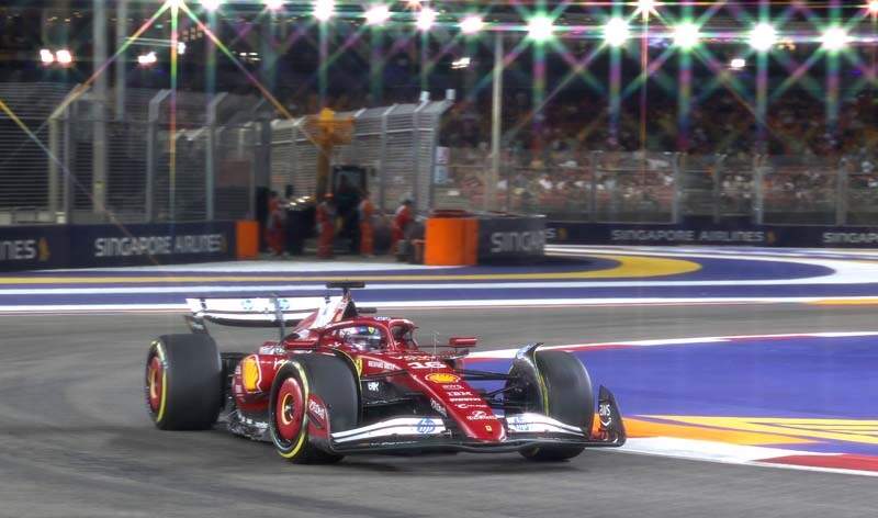 SINGAPORE, SINGAPORE - OCTOBER 03: (EDITORS NOTE: A special effects camera filter was used for this image.) Charles Leclerc of Monaco driving the (16) Scuderia Ferrari SF-25 on track during practice ahead of the F1 Grand Prix of Singapore at Marina Bay Street Circuit on October 03, 2025 in Singapore, Singapore. (Photo by Steven Tee/LAT Images)
