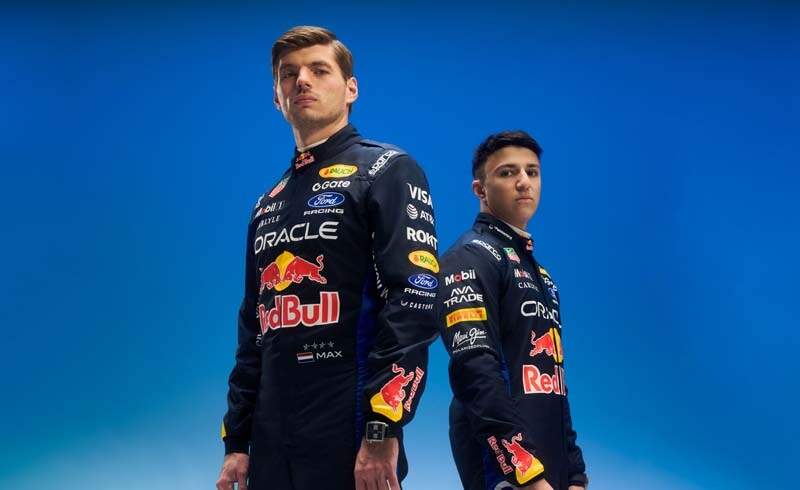 Max Verstappen & Isack Hadjar pose in the 2026 Oracle Red Bull Racing Sparco Race Suits // Khalil Musa / Red Bull Content Pool // SI202601220265 // Usage for editorial use only //