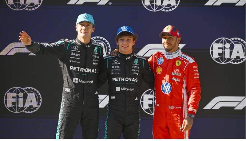 SHANGHAI, CHINA - MARCH 14: Pole position qualifier Andrea Kimi Antonelli of Italy and Mercedes AMG Petronas F1 Team, Second placed qualifier George Russell of Great Britain and Mercedes AMG Petronas F1 Team and Third placed qualifier Lewis Hamilton of Great Britain and Scuderia Ferrari pose for a photo in parc ferme during qualifying ahead of the F1 Grand Prix of China at Shanghai International Circuit on March 14, 2026 in Shanghai, China. (Photo by Rudy Carezzevoli/Getty Images)